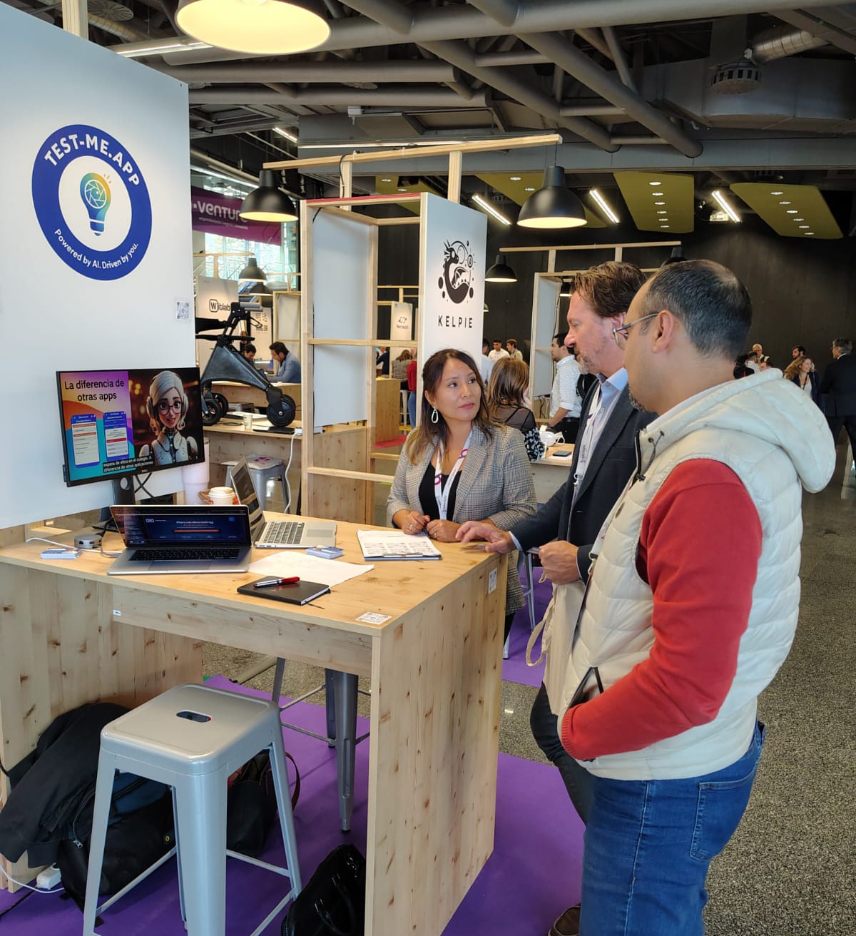 Zerua Tech visiting AI + tech company booth, featuring virtual AI-driven conversational systems; discovering innovative approaches to human-machine interaction.